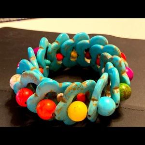 Bracelet of multi colors beads with turquoise ring